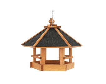 Vogelvoerhuis voederplaats, vogelhuisje gemaakt van hout, vogelhuisje voor balkon en tuin, houten vogeltafel. Vogelvoederbak, tafel, vogelhuis