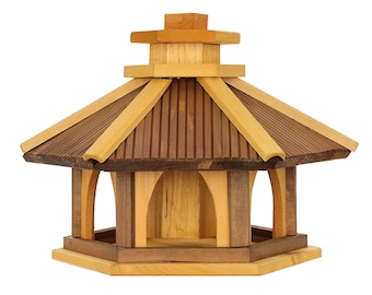 Vogelvoerhuis voederplaats zeshoek gemaakt van hout Vogelhuis, vogelvoeder voor plaatsing voor de tuin.Voederstation voor wilde vogels