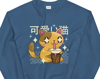 May include: A blue sweatshirt with a cartoon cat wearing a brown and white fur coat drinking boba tea. The cat has large eyes and a pink nose. The text on the sweatshirt says "可愛猫" which translates to "Cute Cat" in English.