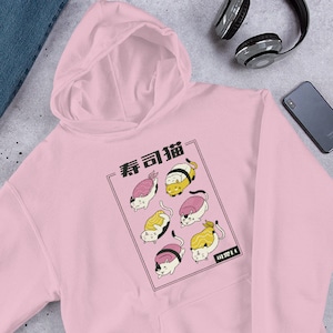 May include: A pink hoodie with a graphic of cats dressed as sushi. The text on the graphic says "寿司猫" which translates to "Sushi Cat".