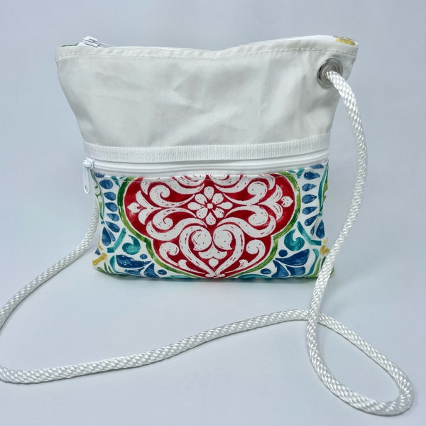 Recycled sailcloth cross-body purse 9 1/2" H x 10" W, zippered main compartment + 3 external  pockets, accent fabric,