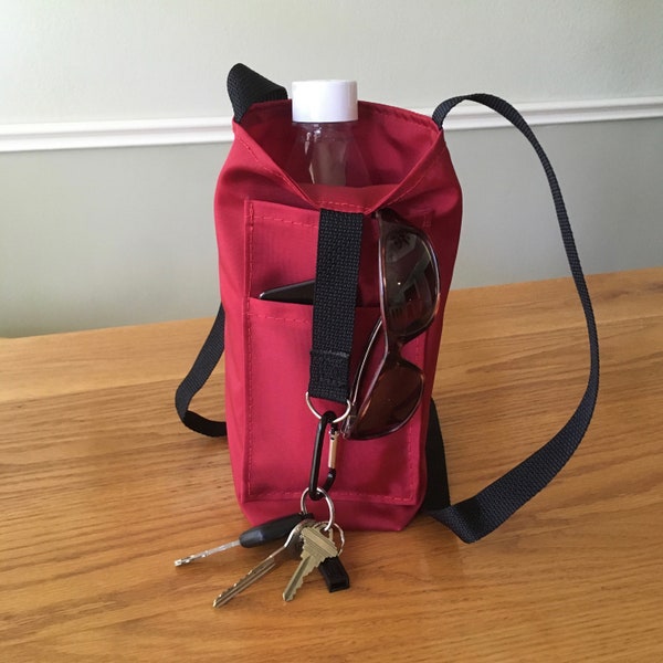 Water bottle tote with 2 external pockets,  crossbody strap, built in keyring holder, carabiner.  Hikes/Dog walks/Fitness/Birding/Travel