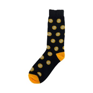 May include: Black socks with a yellow Bitcoin pattern.