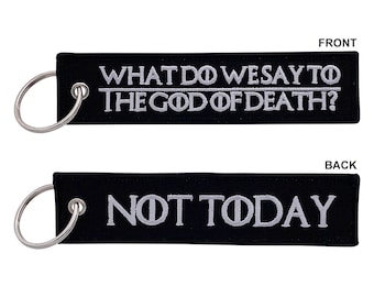 What Do We Say To The God of Death? (Black/White) - Keychain Jet Tag for Motorcycles, Scooters, Bike, Cars, Backpacks, Gifts, & More
