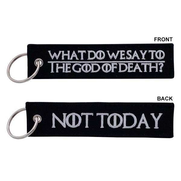 Que disons-nous au dieu de la mort ? (Noir/Blanc) - Porte-clés Jet Tag pour motos, scooters, vélos, voitures, sacs à dos, cadeaux, etc.