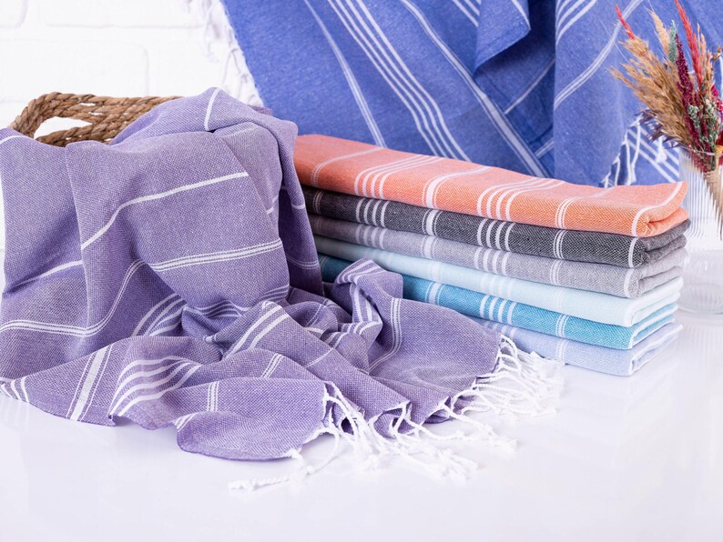 Wedding gift beach towels decorated with my bridesmaids' names on elegant paper wrappers