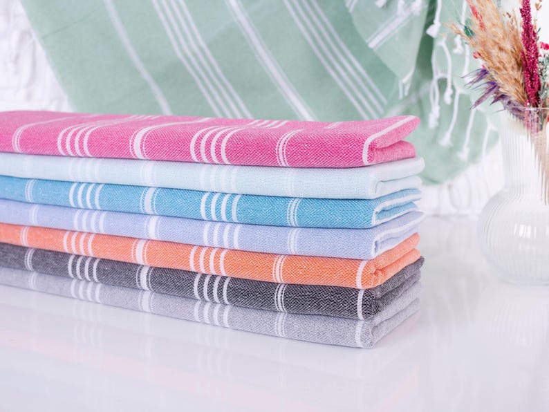 Wedding gift beach towels decorated with my bridesmaids' names on elegant paper wrappers