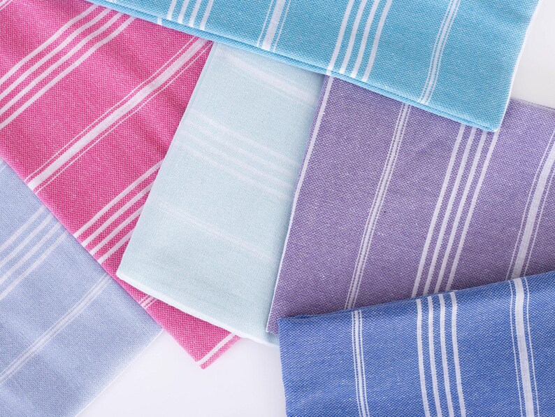 Wedding gift beach towels decorated with my bridesmaids' names on elegant paper wrappers
