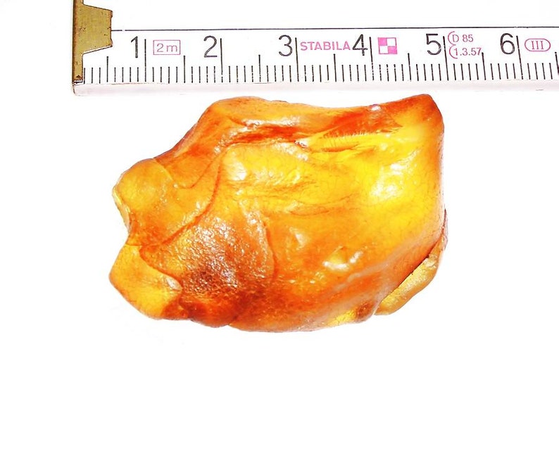 Magnificent-large super-clear translucent 13.25 g. natural raw amber