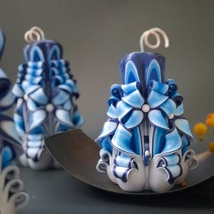 Blue and white carved candles.Three sizes.