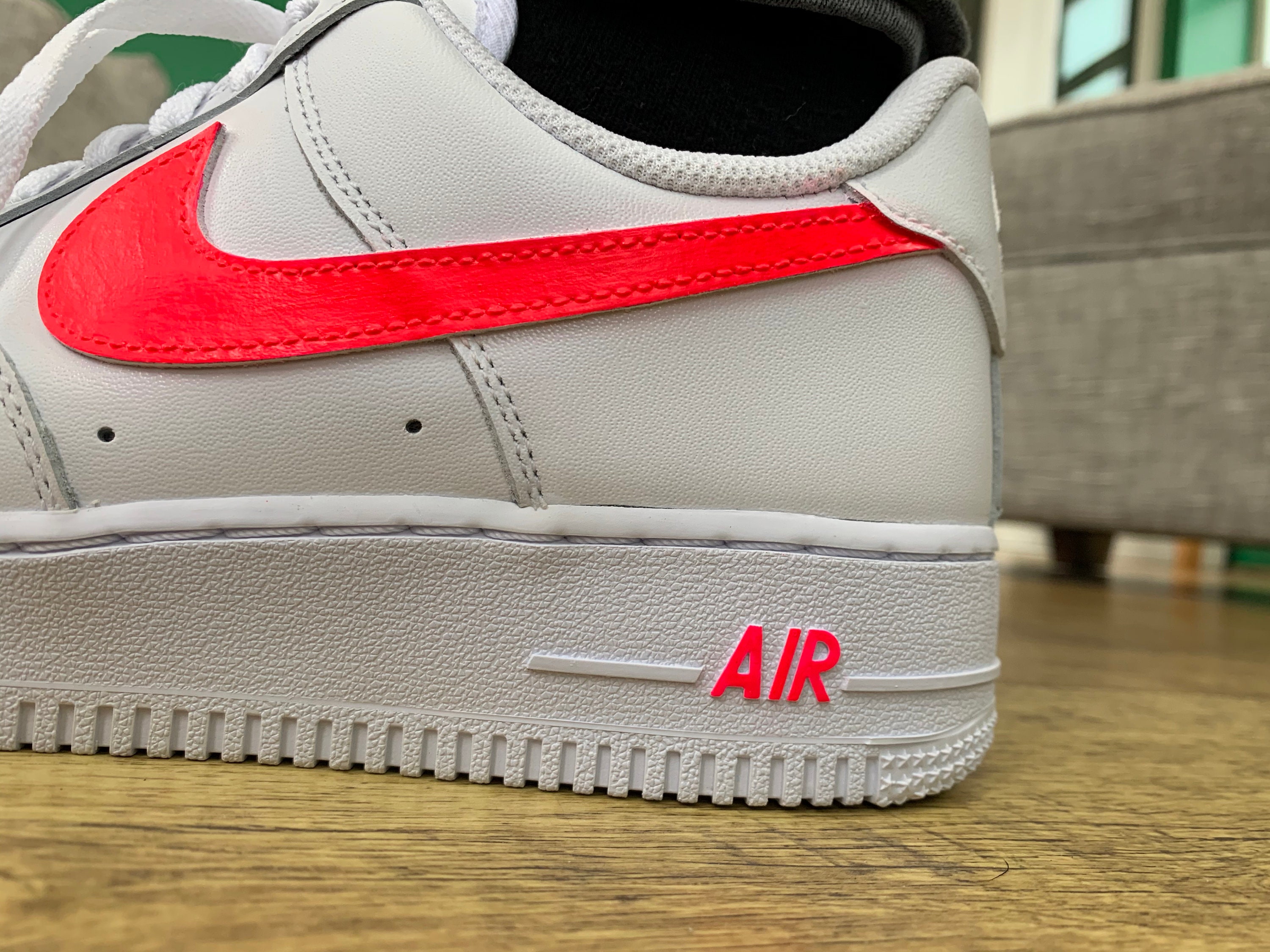 white air force with neon tick
