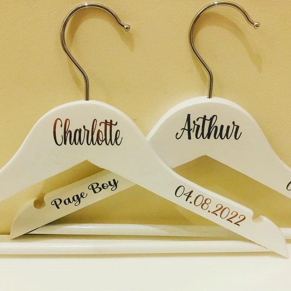 White wooden children's bridal hangers with personalised details | bridal party hangers | page boy hangers | flower girl hangers
