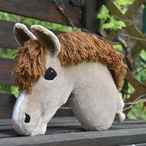Beautiful cute palomino hobby horse for sale. Very good gift for kids. With white markings.