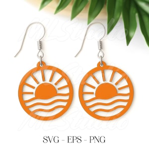 May include: A pair of orange, laser-cut earrings featuring a sun and wave design. The earrings have a circular shape with a sunburst pattern and three wavy lines. The earrings hang from silver-colored hooks. The text "SVG - EPS - PNG" is at the bottom.