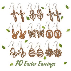 May include: A collection of ten wooden Easter earrings in various shapes, including crosses, tulips, bunnies, butterflies, Easter eggs, and flowers. The earrings are brown and have silver hooks. The text "10 Easter Earrings" is at the bottom.