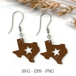 May include: A pair of brown wooden earrings shaped like the state of Texas, each with a star cutout. The earrings hang from silver-colored fish hook ear wires. The text "SVG - EPS - PNG" is at the bottom.
