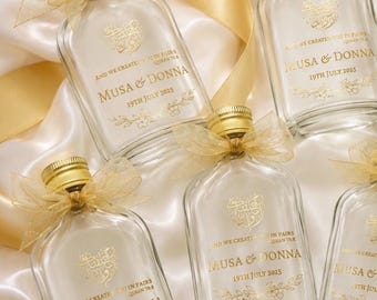 Botellas Zam Zam personalizadas con lámina metálica - Varios tamaños - Pegatinas transparentes - Rellenas
