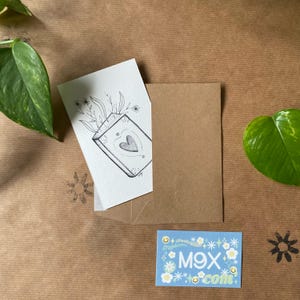 Carte avec Enveloppe – Illustration Livre et Fleurs, Papeterie Poétique, Carte de Vœux Élégante
