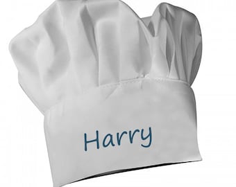 May include: White chef hat with the name "Harry" embroidered in blue on the front.