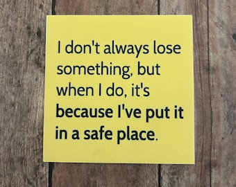 May include: A yellow sticky note with the text "I don't always lose something, but when I do, it's because I've put it in a safe place."