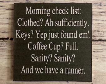 Puede incluir: Un letrero negro con texto blanco que dice "Morning check list: Clothed? Ah sufficiently. Keys? Yep just found em'. Coffee Cup? Full. Sanity? Sanity? And we have a runner."