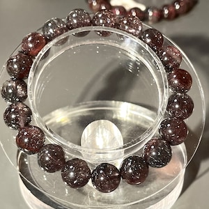 10mm Firework AA Black Super Seven Beads Bracelet. Strongest energy among crystal bracelet. Top quality Super Seven.