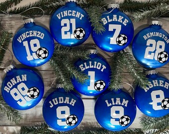 Gepersonaliseerde kerstversieringen met voetbalthema