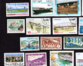 May include: A collection of colorful postage stamps featuring bridges from various countries. The stamps showcase diverse bridge designs, including arch, suspension, and truss bridges, with text in multiple languages. The stamps are arranged on a black background.