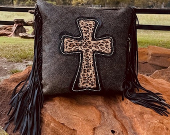 Cowhide custom Black and acid washed black on turquoise loveseat with silver tacks.