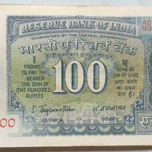 Banconota da 100.000 rupie patti, carta moneta originale