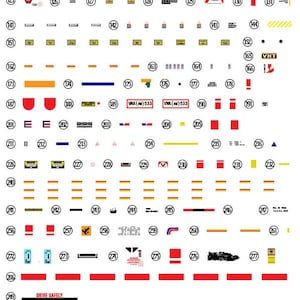May include: A sheet of decals for a 5-foot Millennium Falcon model. The decals include various shapes, lines, and text, such as "VHT" and "DRIVE SAFELY". The decals are in red, yellow, blue, and black.