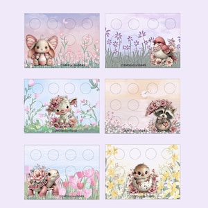May include: Six decorative cards featuring whimsical animal illustrations. Each card has a different animal: a bunny, bird, cow, raccoon, turtle, and chick. The cards have a floral background and circular cutouts.