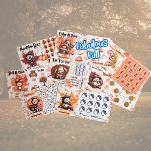 May include: A collection of rectangular paper savings challenge cards featuring autumn-themed illustrations of animals like raccoons, foxes, and bears with pumpkins and leaves. The cards include text such as Pumpkin Race, Fabulous Fall, and Tic Tac Toe, along with grids, circles, and boxes for tracking financial savings goals.