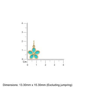 May include: A gold-tone charm in the shape of a turquoise blue flower with a small gold center. The charm is 13.30mm x 15.30mm.