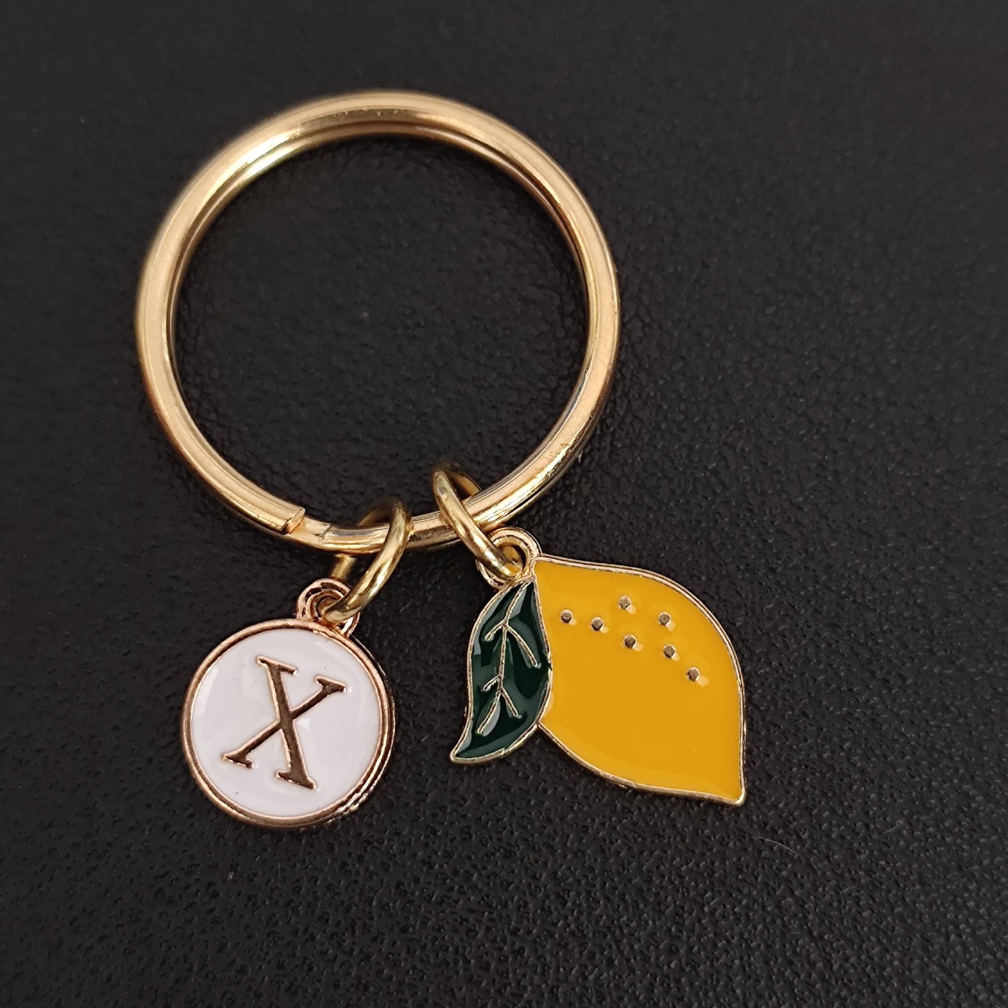 Braccialini Portachiavi Portachiavi in metallo con pendente a forma di limone e una nappa sintetica