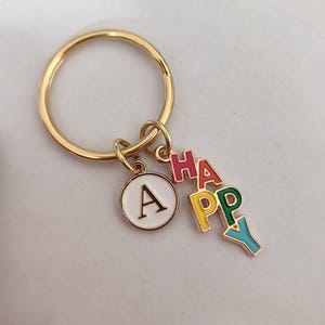 Llavero con palabras felices como regalo para niño y niña