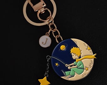 Kleine prins dual-purpose tasbedel of pin