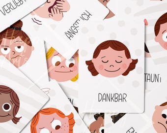 Può includere: Un set di carte colorate con illustrazioni di diverse espressioni facciali e parole tedesche che descrivono emozioni. Le parole includono "verliebt", "ängstlich", "dankbar", "taunig", "enttäuscht" e "nhu".