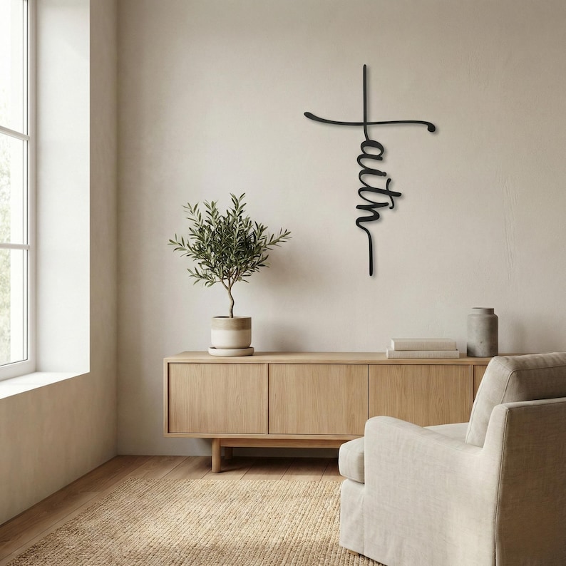 a serene living room with a large window, a wooden cabinet, a comfortable chair, and a potted plant. The room has a minimalist and modern design, with a large black cross-shaped sign hanging on the wall.