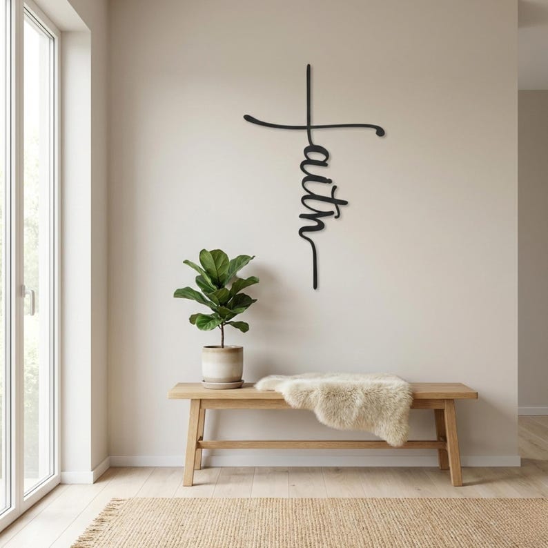 a minimalist interior design with a wooden bench, a potted plant, and a large metal cross-shaped sign with the word "Faith" written on it.