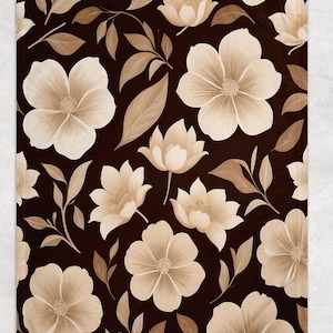 May include: A floral pattern blanket featuring large, cream-colored flowers and leaves against a dark brown background. The design is repeated across the surface, creating a seamless and elegant look. The blanket is likely made of soft material.