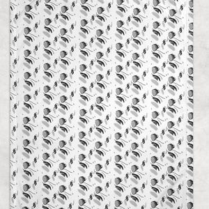 May include: White blanket with a repeating pattern of stylized, abstract floral designs in black and gray. The flowers have rounded shapes and long, curved stems, creating a modern, minimalist aesthetic.