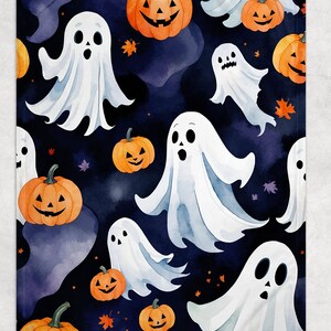 May include: A Halloween-themed blanket featuring a repeating pattern of white ghosts and orange jack-o'-lanterns against a dark blue background. The watercolor-style design includes orange and purple accents, creating a festive and spooky aesthetic.