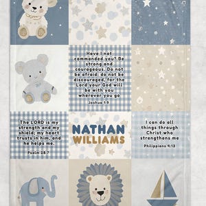 May include: A baby blanket with a patchwork design featuring a lamb, bear, elephant, lion, and sailboat. The blanket includes the name "NATHAN WILLIAMS" and Bible verses in blue and beige squares.