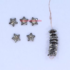 Set van 4 stuks met pavé diamanten stervormige doppen, geoxideerd sterling zilver.