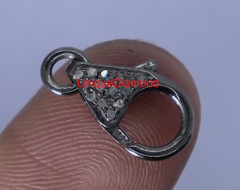 May include: Silver clasp with a diamond-encrusted design. The clasp is marked with "925" indicating sterling silver.