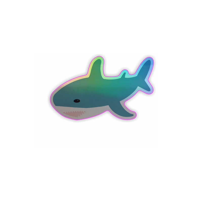 May include: A holographic sticker of a blue shark with a white belly and a pink mouth.
