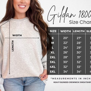 May include: A light gray crewneck sweatshirt with a size chart. The chart displays measurements in inches for width, length, and sleeve length, ranging from size small to 5XL. The text "Gildan 18000" is also visible.
