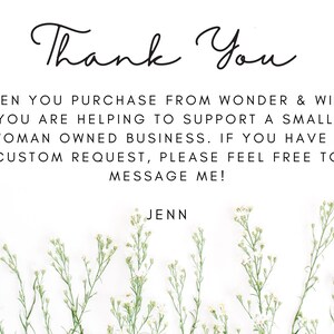 May include: A white background with the words "Thank You" in a cursive font. The text below states that purchases support a small, woman-owned business. Delicate white flowers line the bottom.