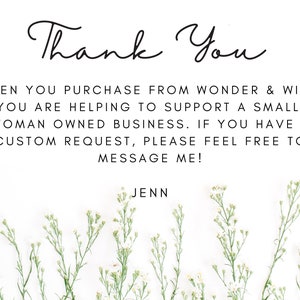 May include: A white card with the words "Thank You" in elegant script. Below, text reads: "When you purchase from Wonder & Wild, you are helping to support a small, woman owned business." Floral accents frame the bottom.